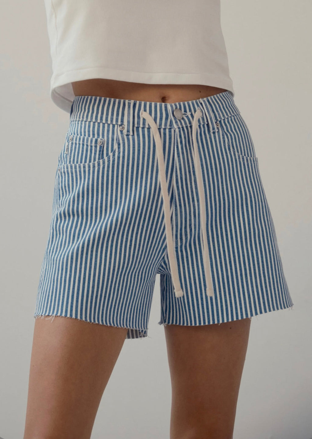 DL1961 High-Rise Relaxed Raw Hem Denim Shorts