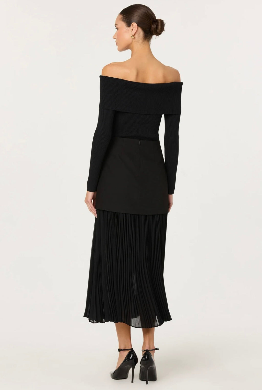 Semi-Sheer Pleated Layered Skirt with Architectural Silhouette