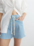 DL1961 High-Rise Relaxed Raw Hem Denim Shorts