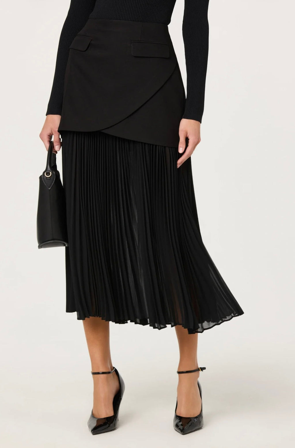 Semi-Sheer Pleated Layered Skirt with Architectural Silhouette