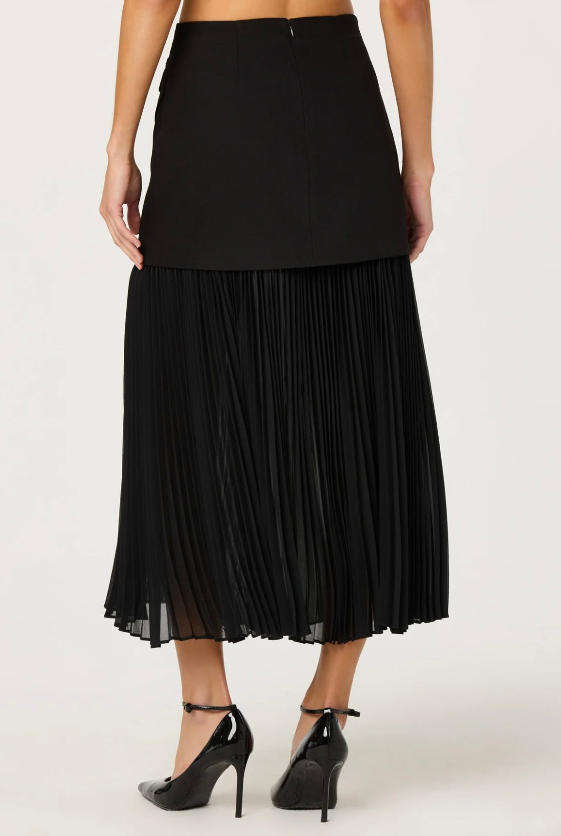 Semi-Sheer Pleated Layered Skirt with Architectural Silhouette