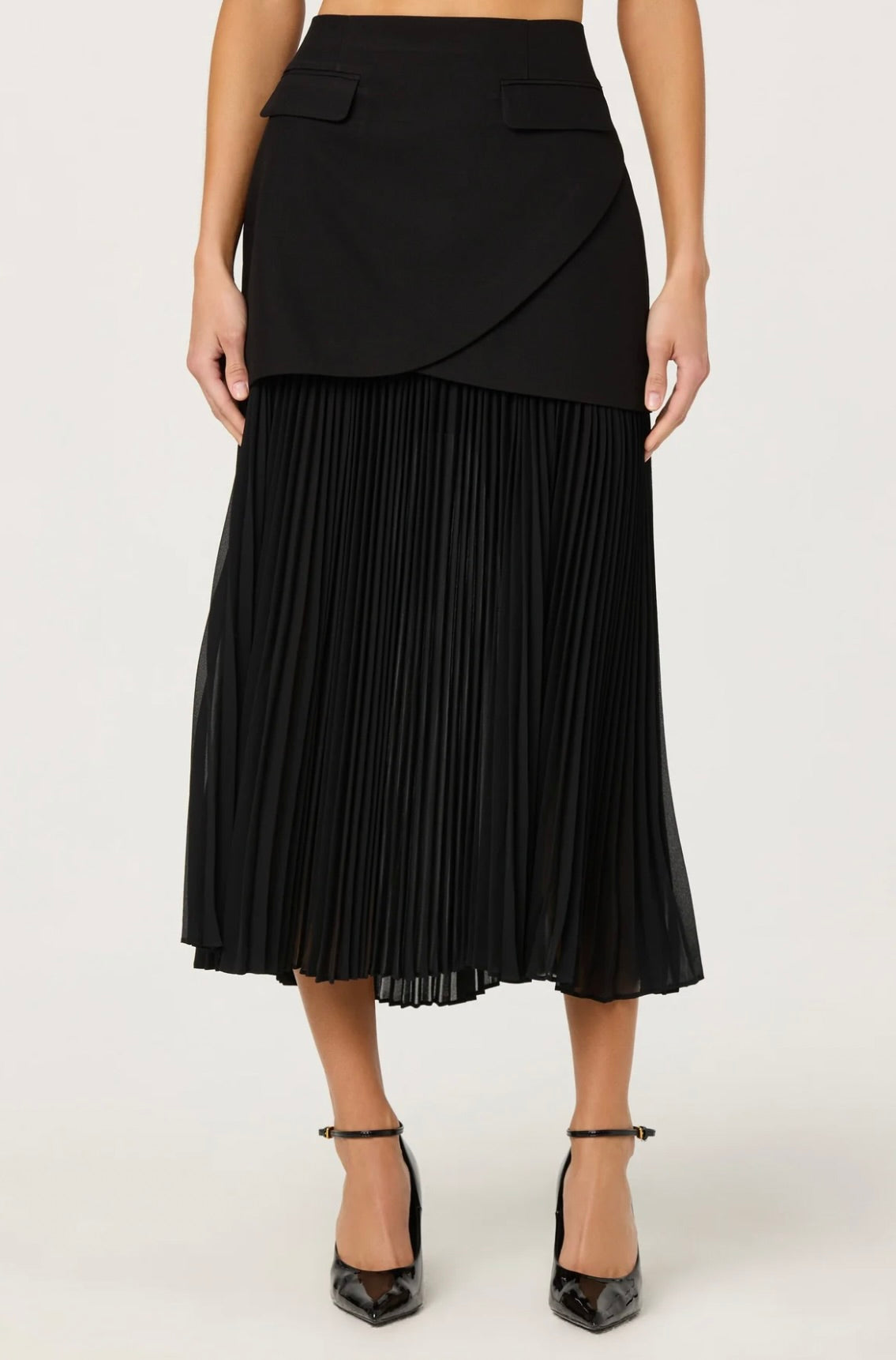 Semi-Sheer Pleated Layered Skirt with Architectural Silhouette